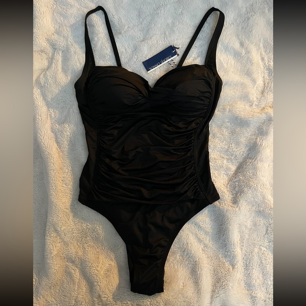 One piece black swim suite body shaping 😉 tag still on originally 78$